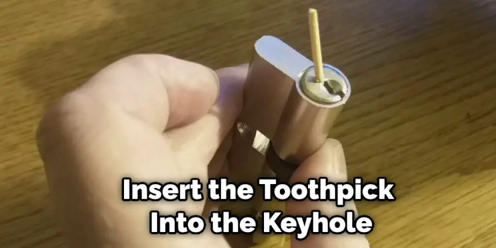 Insert the Toothpick Into the Keyhole