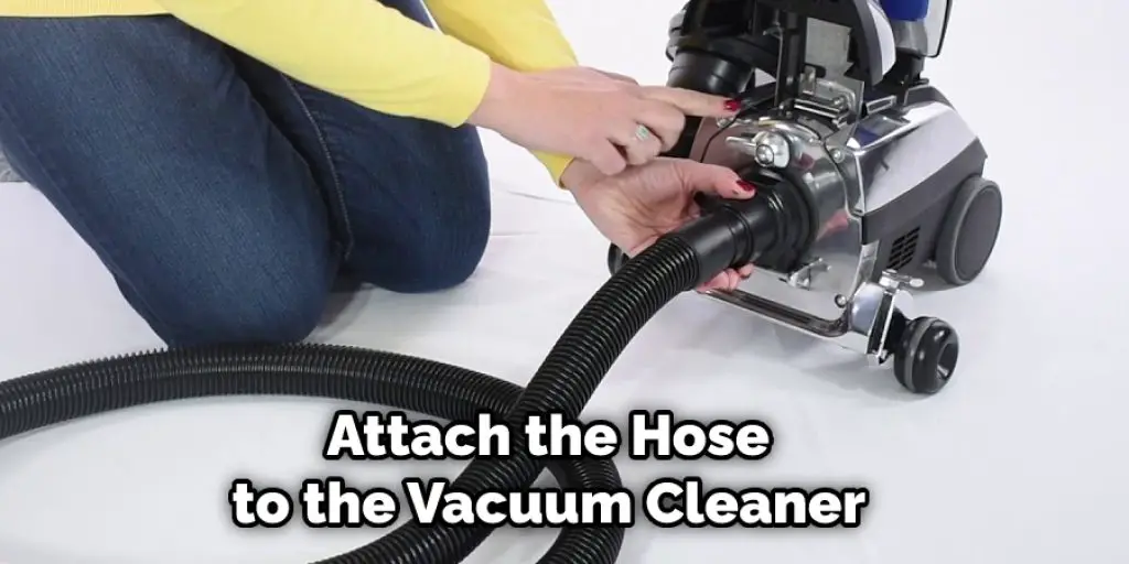 Attach the Hose to the Vacuum Cleaner 