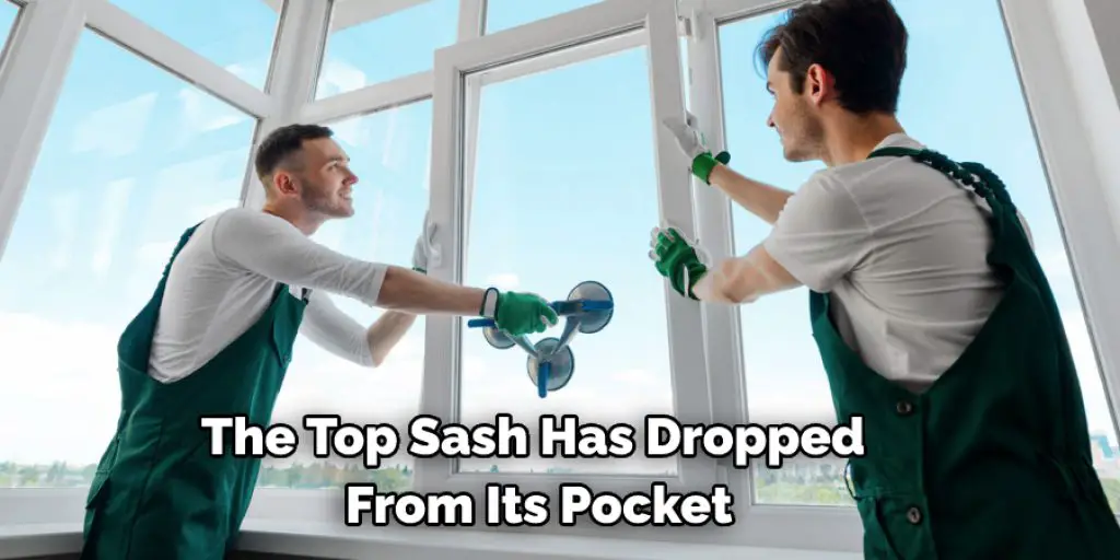 The Top Sash Has Dropped  From Its Pocket
