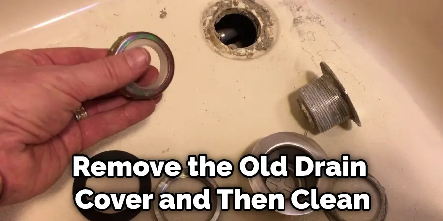 Remove the Old Drain Cover and Then Clean