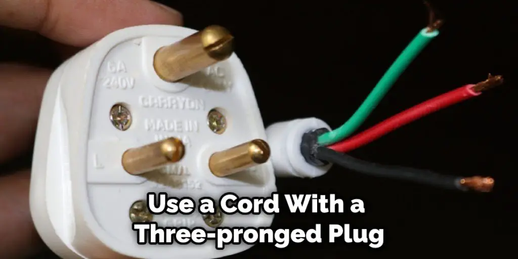 Use a Cord With a  Three-pronged Plug
