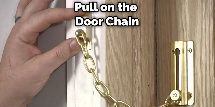 Pull on the  Door Chain