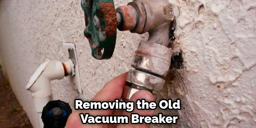 Removing the Old  Vacuum Breaker