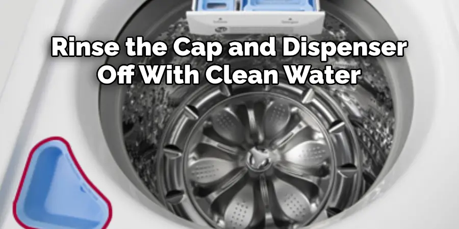 Rinse the Cap and Dispenser Off With Clean Water