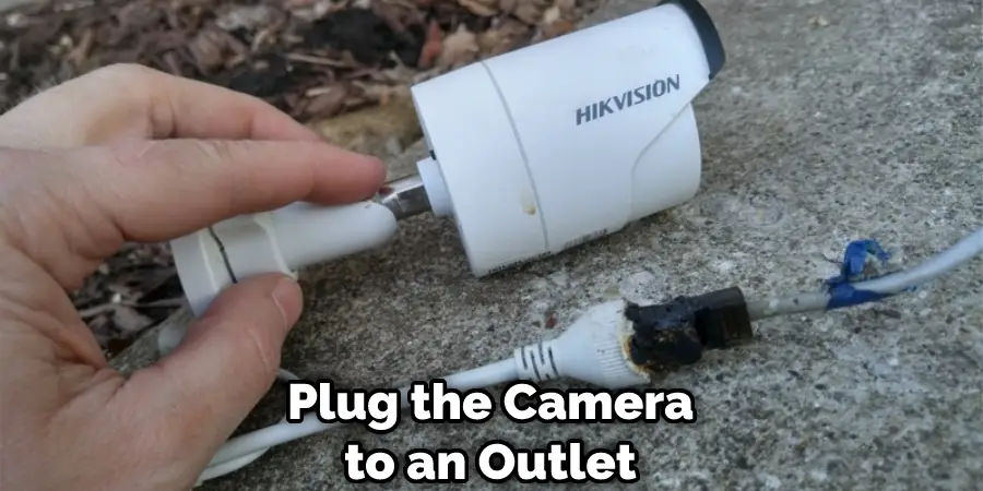 Plug the Camera to an Outlet