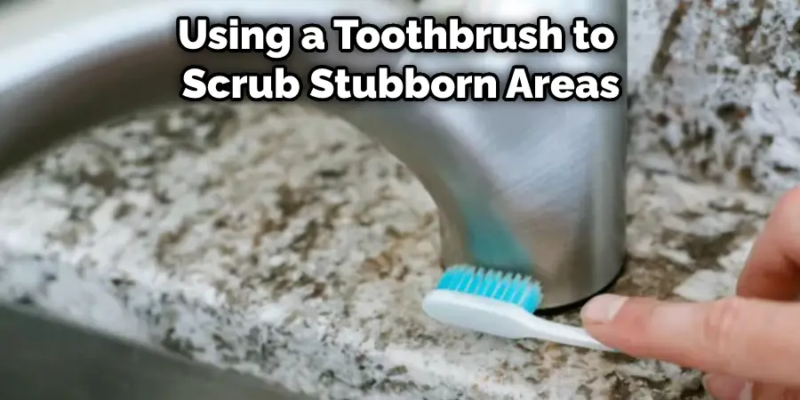 Using a Toothbrush to Scrub Stubborn Areas