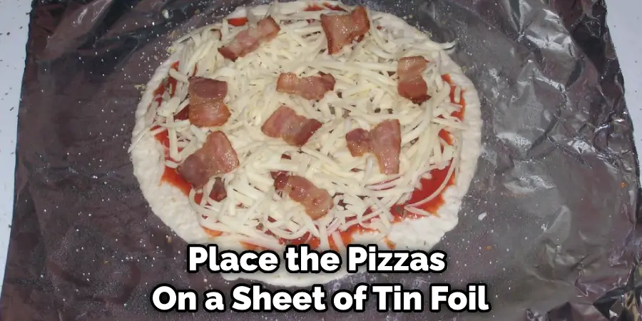 Place the Pizzas on a Sheet of Tin Foil