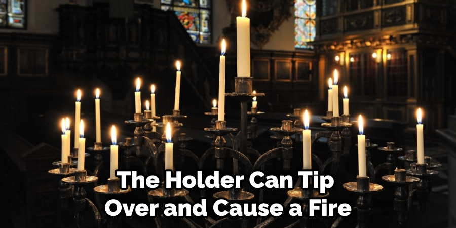 The Holder Can Tip Over and Cause a Fire