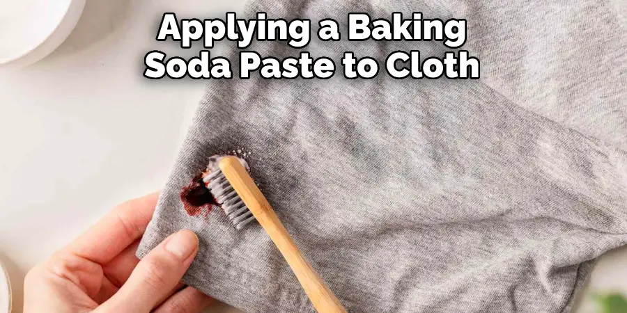Applying a Baking Soda Paste to Cloth