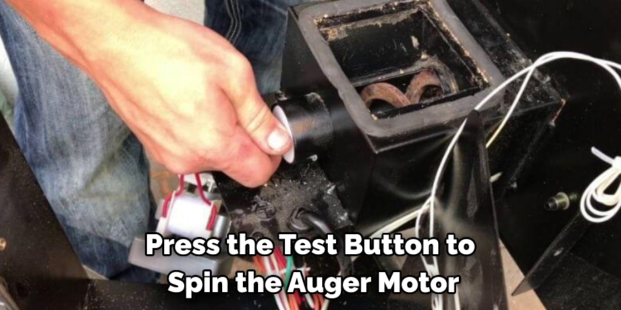 Press the Test Button to Spin the Auger Motor