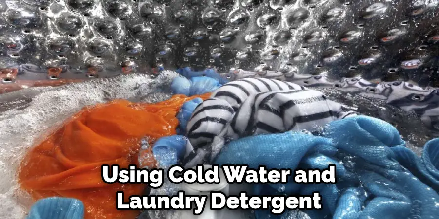 Using Cold Water and Laundry Detergent