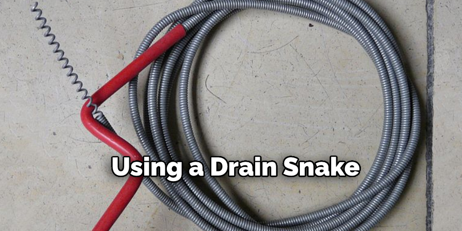 Using a Drain Snake