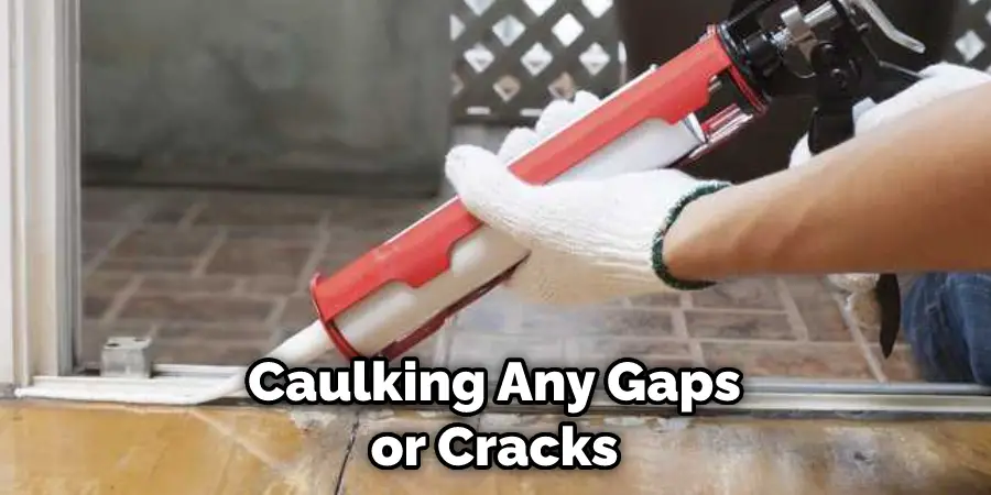 Caulking Any Gaps or Cracks