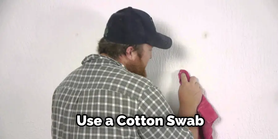 Use a Cotton Swab