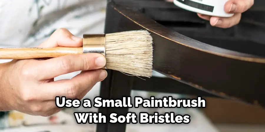 Use a Small Paintbrush With Soft Bristles