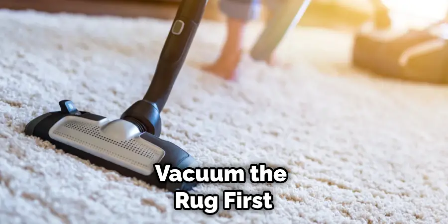 Vacuum the Rug First