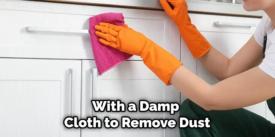 With a Damp Cloth to Remove Dust
