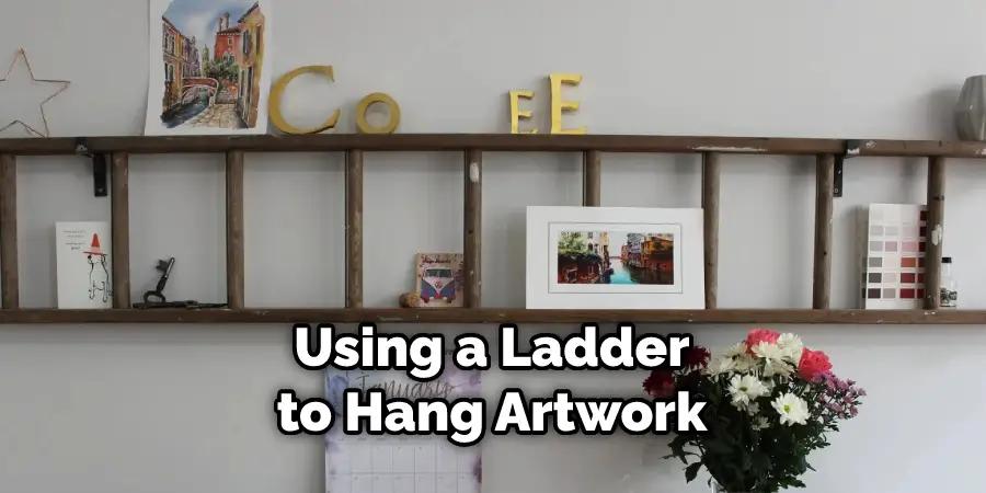 Using a Ladder to Hang Artwork