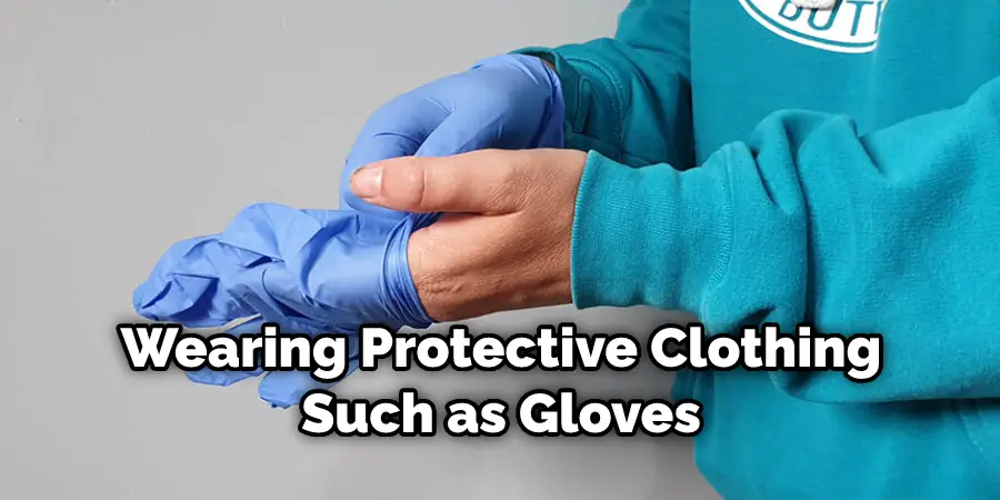 Wearing Protective Clothing Such as Gloves