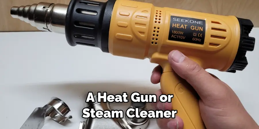A Heat Gun or Steam Cleaner