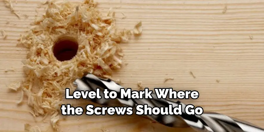 Level to Mark Where the Screws Should Go