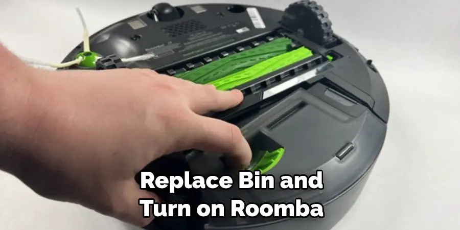 Replace Bin and Turn on Roomba