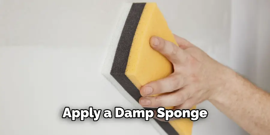 Apply a Damp Sponge