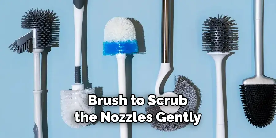 Brush to Scrub the Nozzles Gently