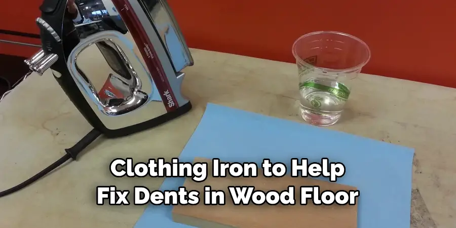 Clothing Iron to Help Fix Dents in Wood Floor