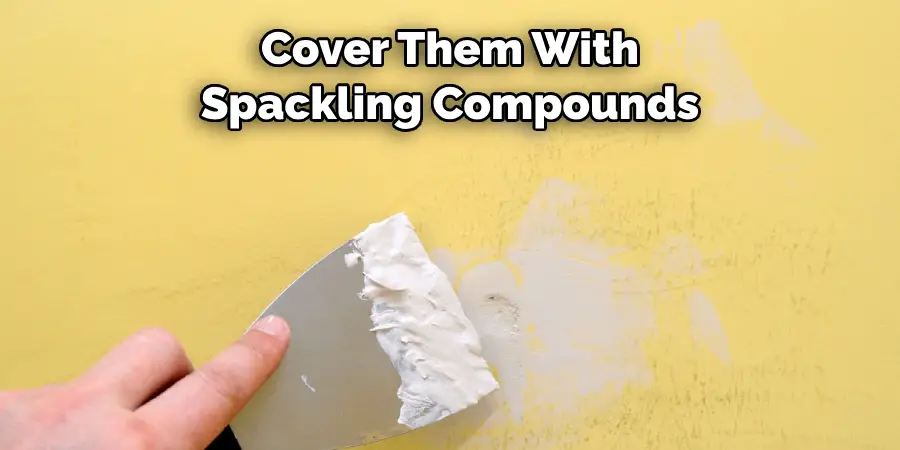 Cover Them With 
Spackling Compounds