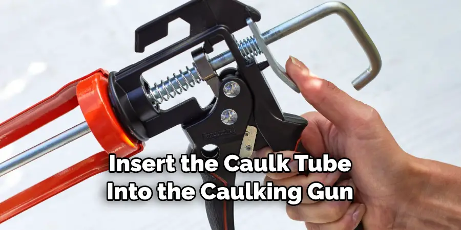 Insert the Caulk Tube Into the Caulking Gun