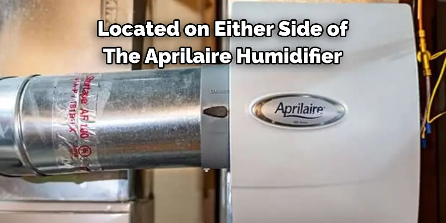 Located on Either Side of 
The Aprilaire Humidifier