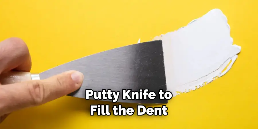 Putty Knife to Fill the Dent