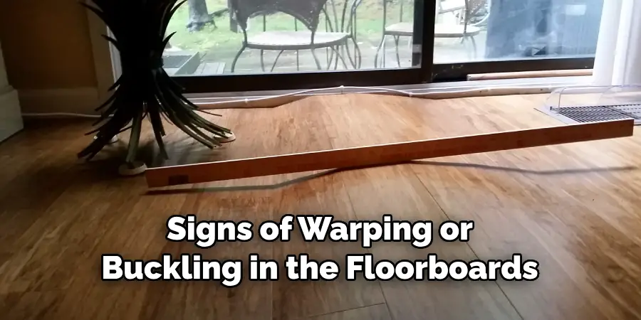 Signs of Warping or Buckling in the Floorboards