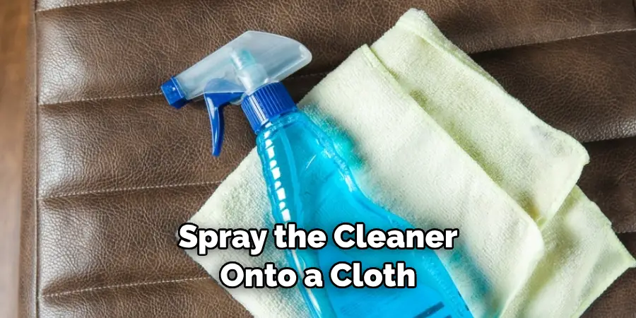 Spray the Cleaner Onto a Cloth