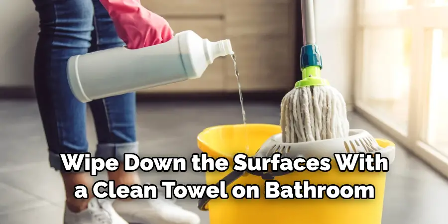 Wipe Down the Surfaces With a Clean Towel on Bathroom