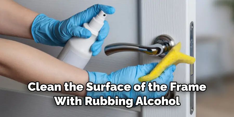 Clean the Surface of the Frame With Rubbing Alcohol