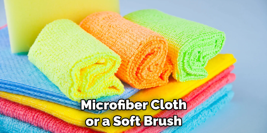Microfiber Cloth or a Soft Brush