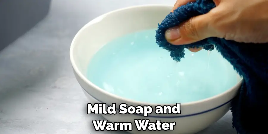 Mild Soap and Warm Water