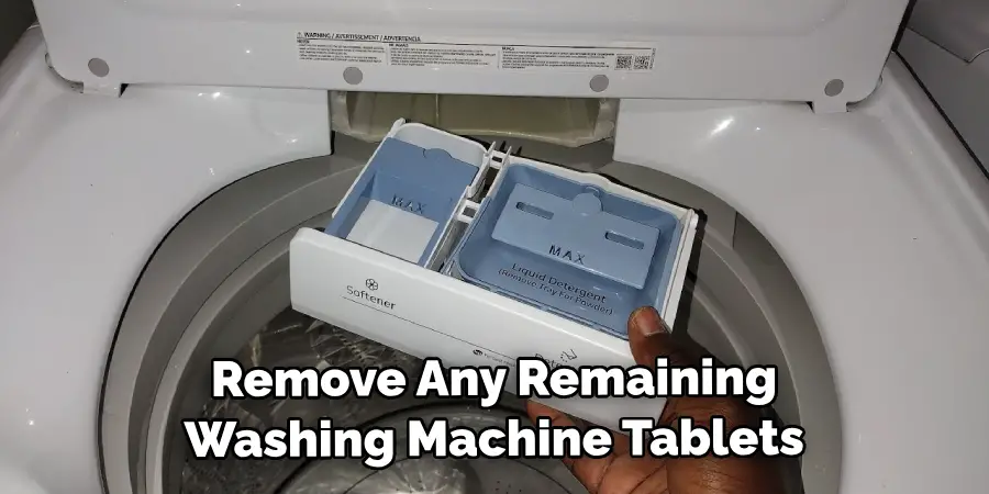 Remove Any Remaining Washing Machine Tablets