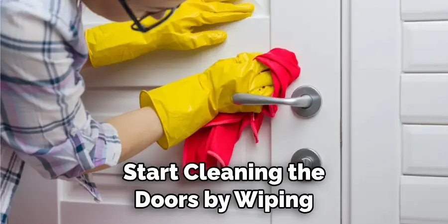 Start Cleaning the Doors by Wiping