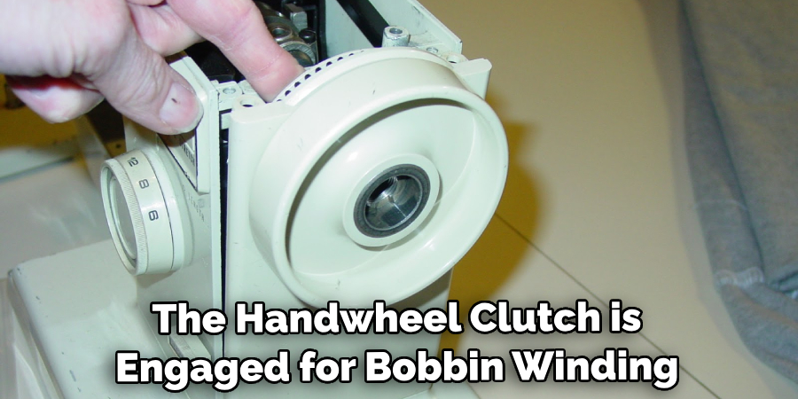 The Handwheel Clutch is Engaged for Bobbin Winding
