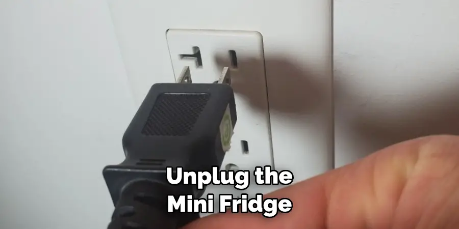 Unplug the Mini Fridge