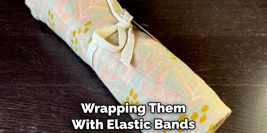 Wrapping Them With Elastic Bands