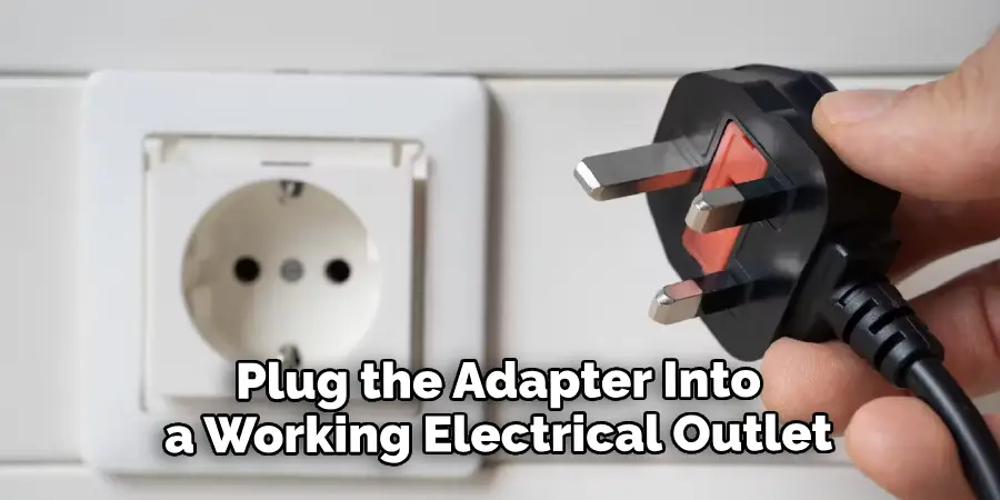 Plug the Adapter Into a Working Electrical Outlet