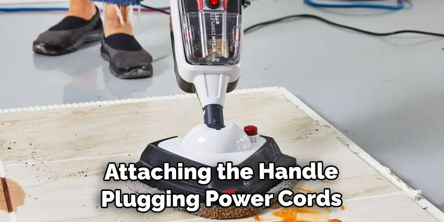 Attaching the Handle Plugging Power Cords