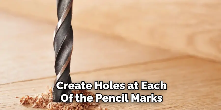 Create Holes at Each
Of the Pencil Marks