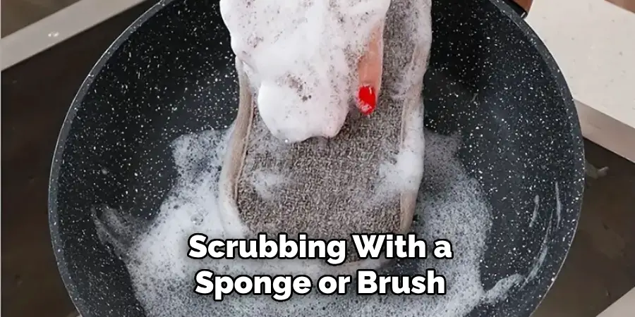 Scrubbing With a
Sponge or Brush