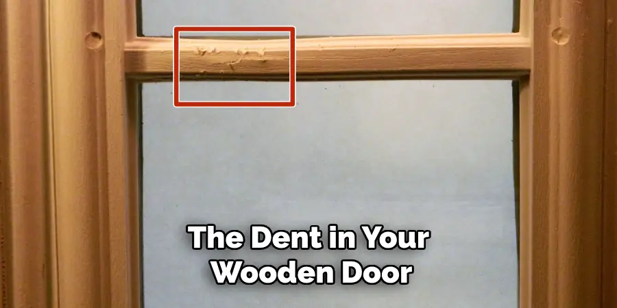 The Dent in Your Wooden Door