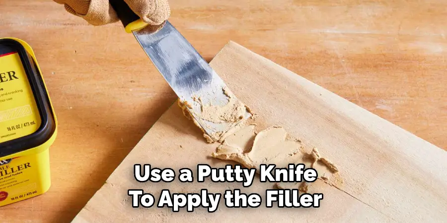 Use a Putty Knife
To Apply the Filler